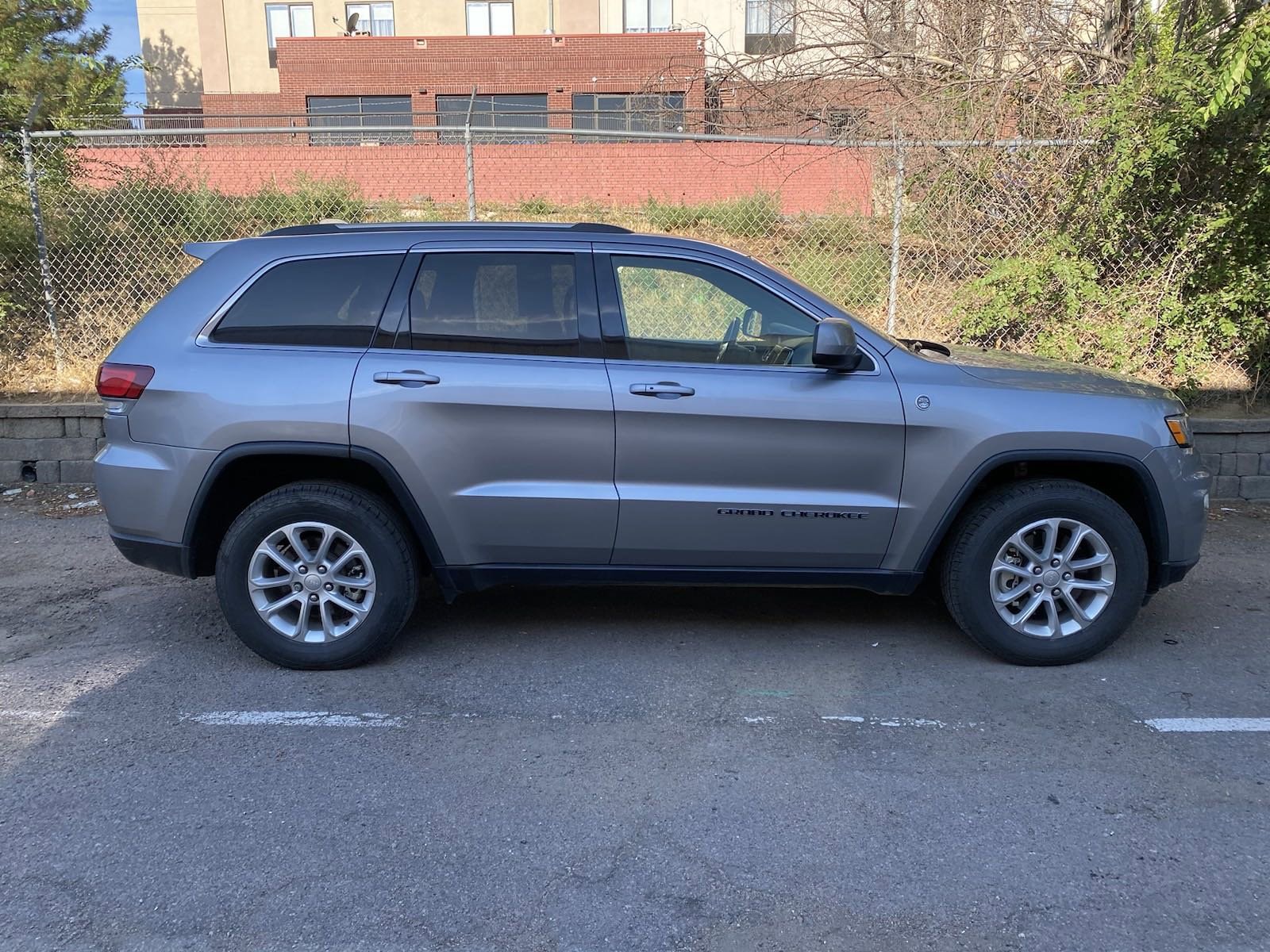 Used 2021 Jeep Grand Cherokee Laredo E with VIN 1C4RJFAG4MC810741 for sale in Denver, CO