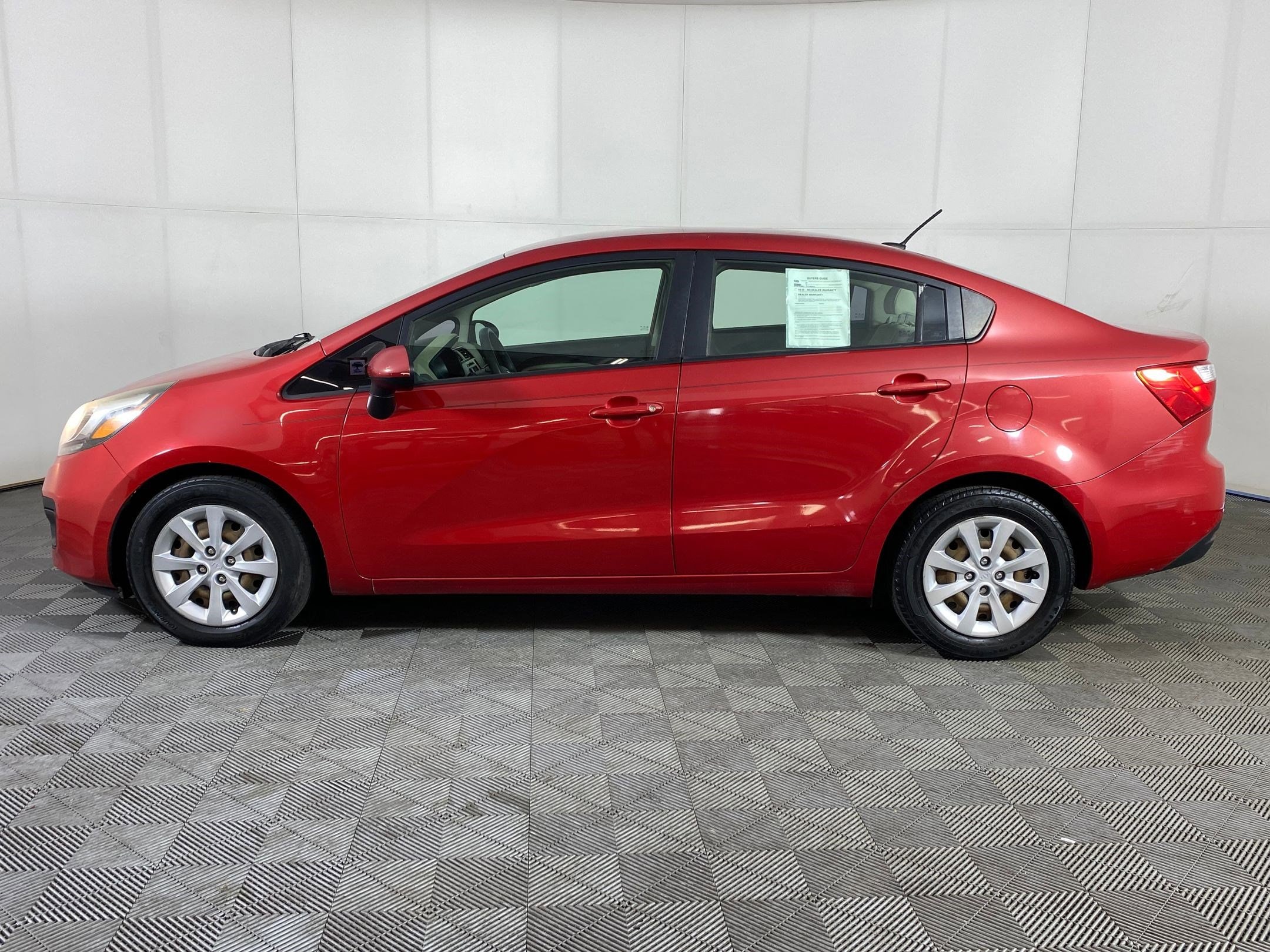 Used 2013 Kia Rio LX with VIN KNADM4A37D6199358 for sale in Denver, CO