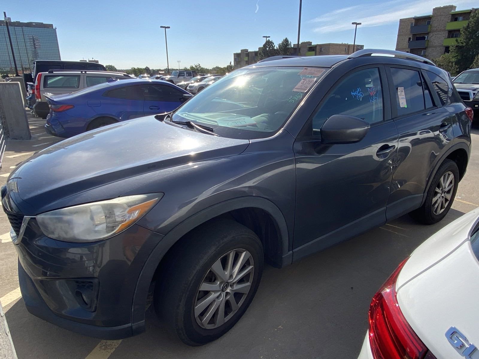 Used 2014 Mazda CX-5 Touring with VIN JM3KE4CY7E0325892 for sale in Denver, CO