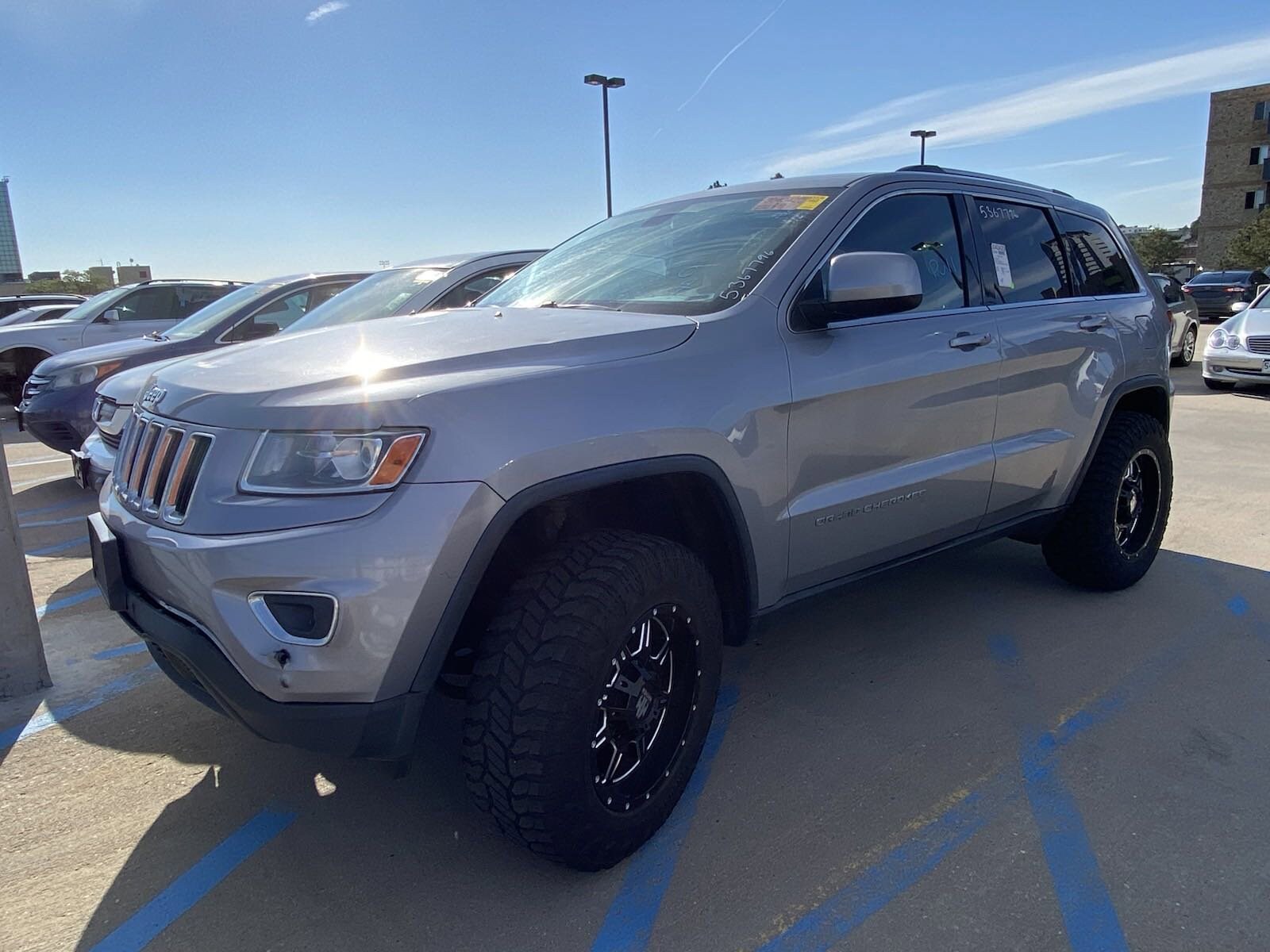 Used 2014 Jeep Grand Cherokee Laredo with VIN 1C4RJFAG5EC211753 for sale in Denver, CO