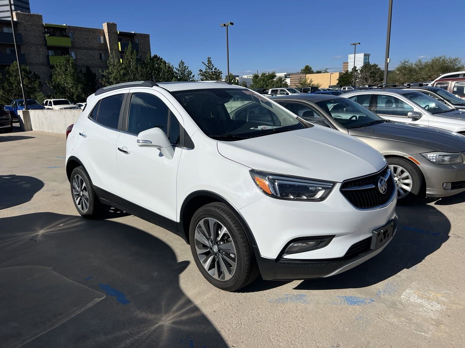 Used 2019 Buick Encore Essence with VIN KL4CJGSM9KB774011 for sale in Denver, CO