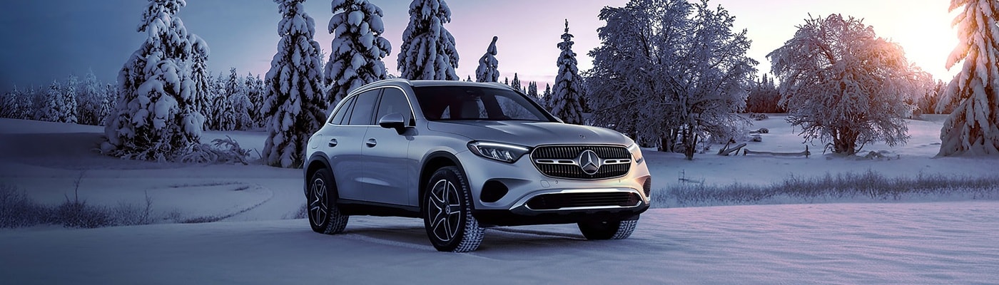Mercedes-Benz GLC Silver Mercedes-Benz GLC 300 parked in a snowscape