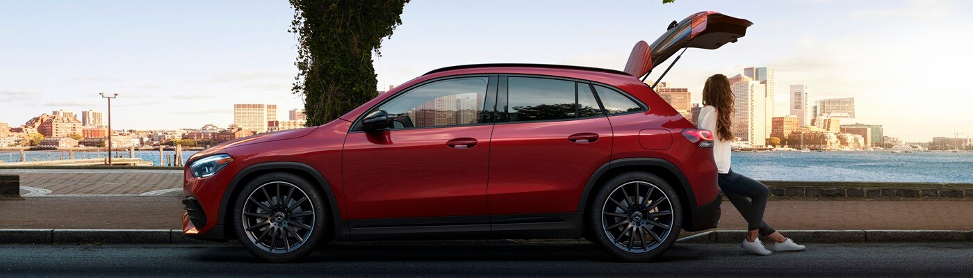 Mercedes-Benz GLA Red Mercedes-Benz GLA parked beside a bay