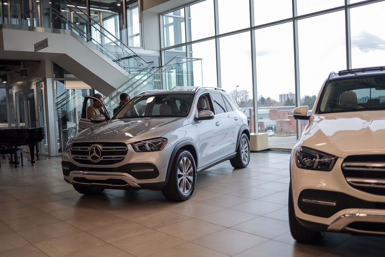 Mercedes-Benz of Denver Showroom Interior Mercedes-Benz of Denver Showroom Interior with a GLC parked