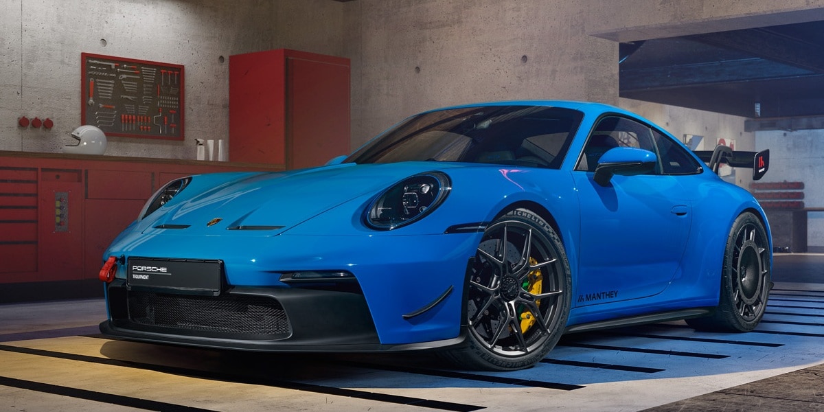 911 GT3 Manthey Performance Kit Blue 911 GT3 Manthey Performance Kit Model parked in a garage
