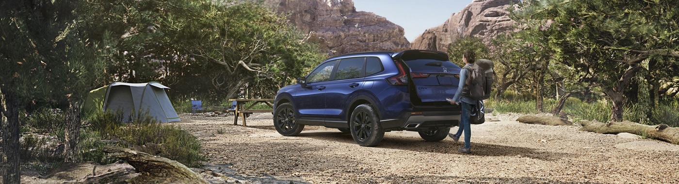 Honda CR-V Blue CR-V parked at a campsite