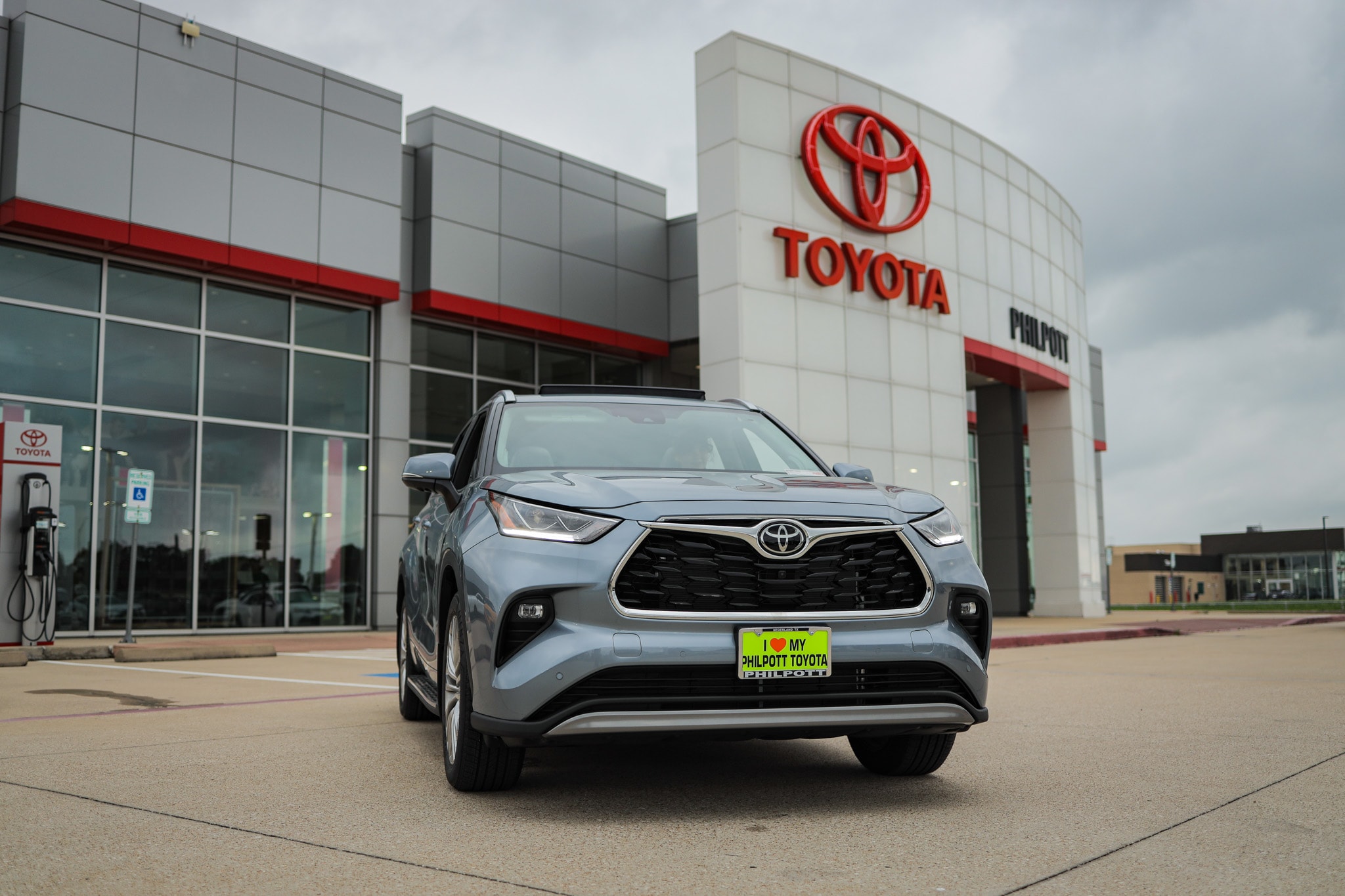 Philpott Toyota storefront Philpott Toyota store front with a Highlander parked out front