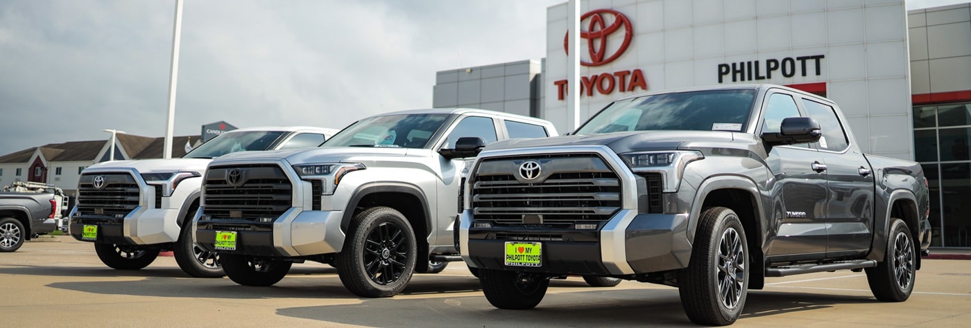 Philpott Toyota Storefront with Tundra trucks parked out front