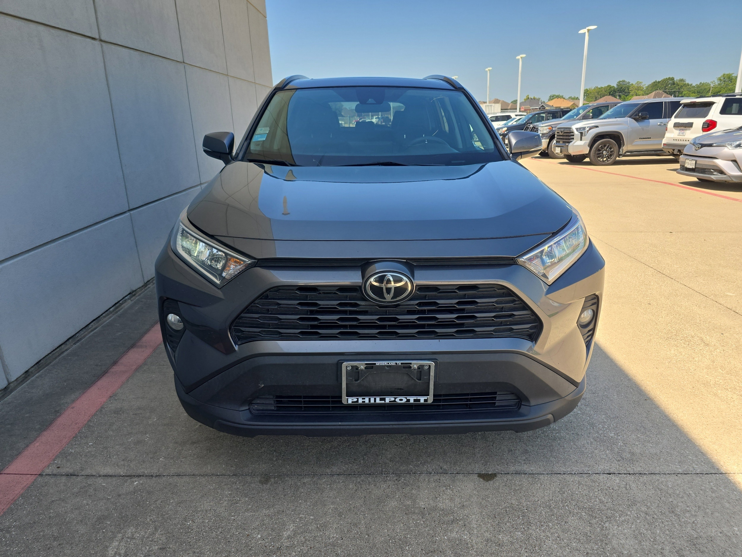Used 2021 Toyota RAV4 XLE Premium with VIN 2T3C1RFV7MC129745 for sale in Northfield, Minnesota