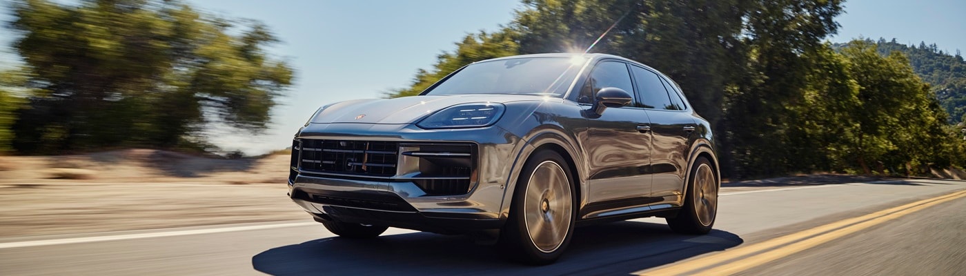 Cayenne S driving on a highway in the sun