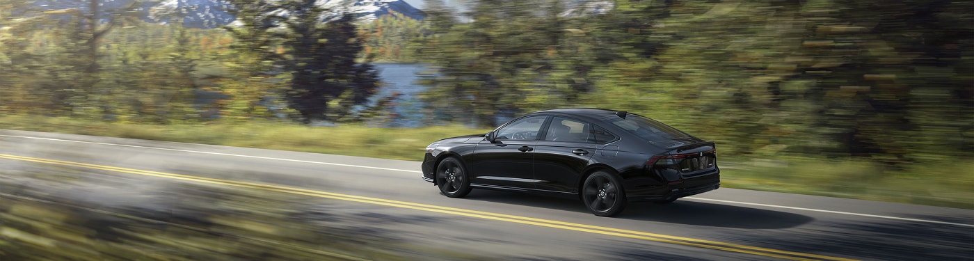 Honda Accord Hybrid driving on a mountain road