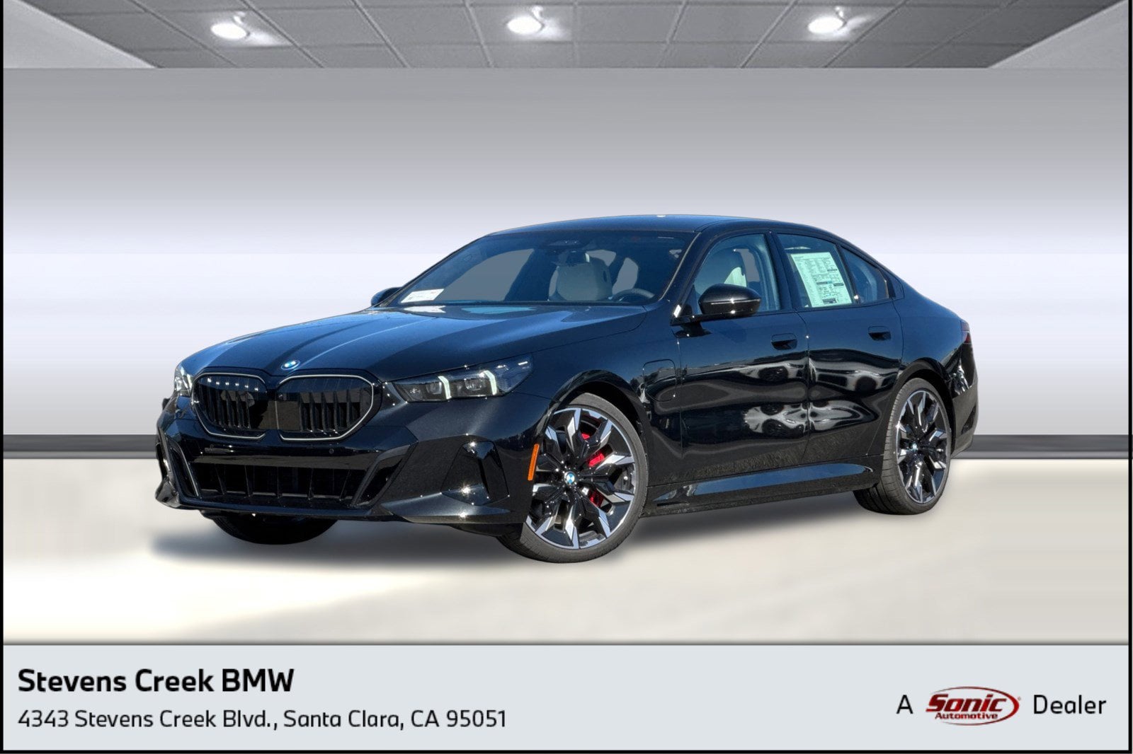 2026 BMW 5 Series 550e xDrive Sedan's photo