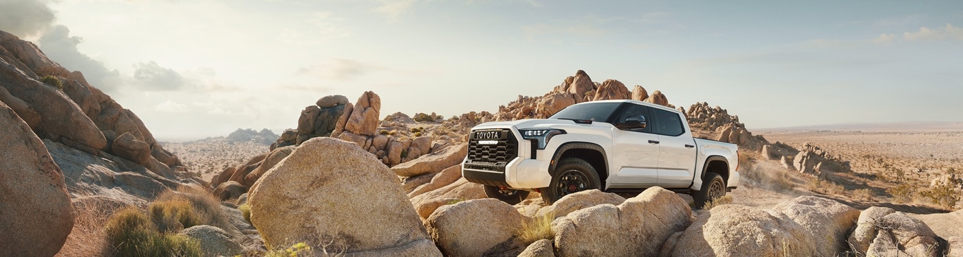White Toyota Tundra TRD PRO driving in the desert
