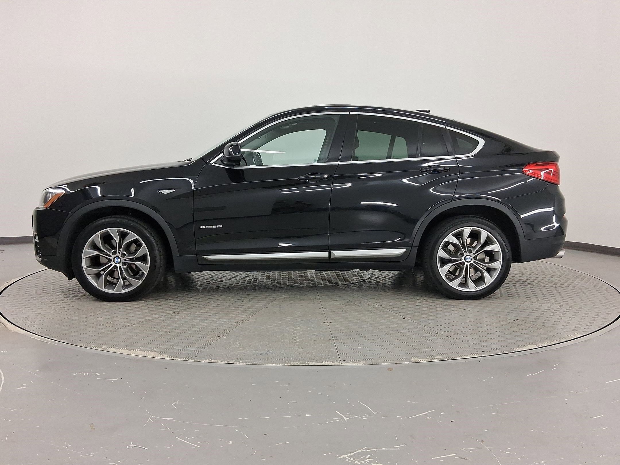Used 2016 BMW X4 xDrive28i with VIN 5UXXW3C53G0R22809 for sale in Irondale, AL