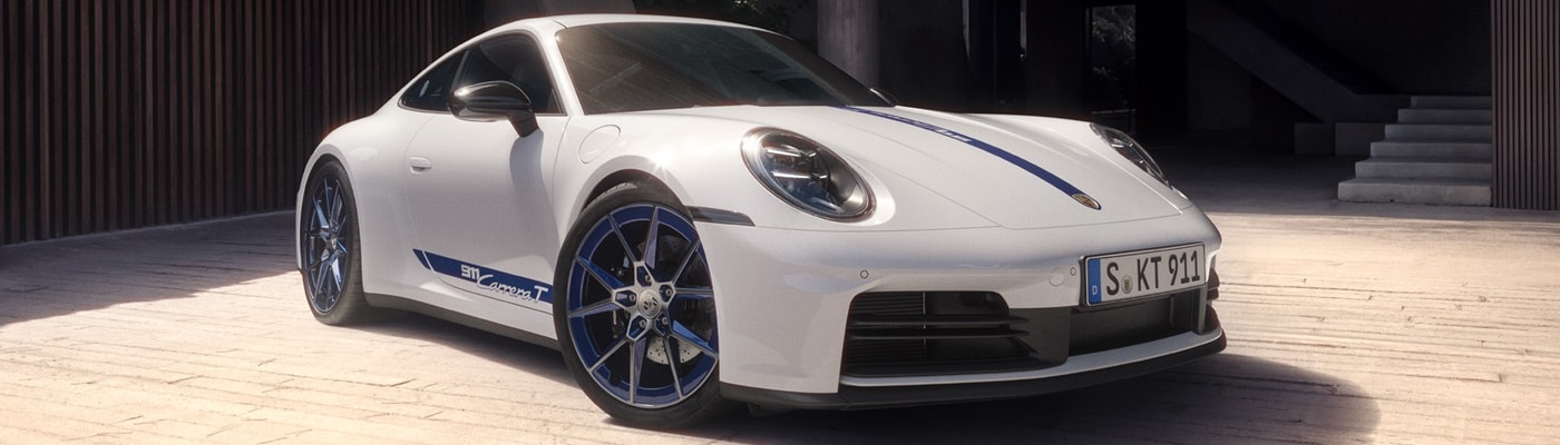 911 Carrera T Coupe parked near a modern house