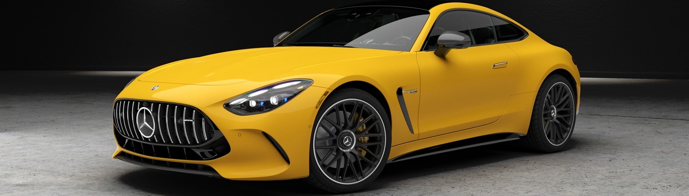 Yellow Mercedes-Benz AMG GT Coupe parked in a warehouse