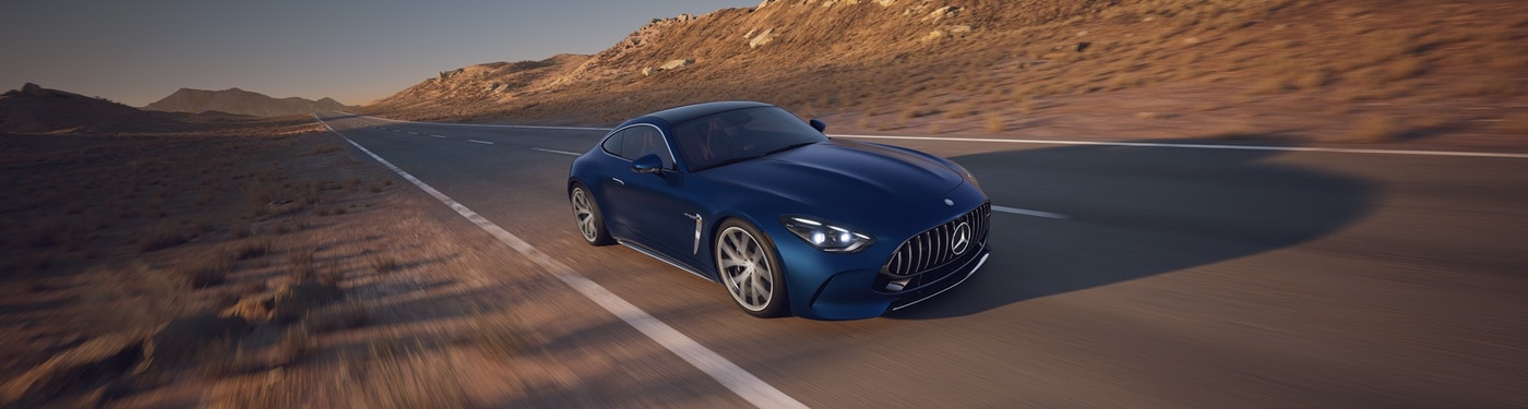 Blue Mercedes-Benz AMG GT Coupe driving in the desert