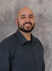 Staff member JUSTIN VLOTHO from c2b73eb4945b