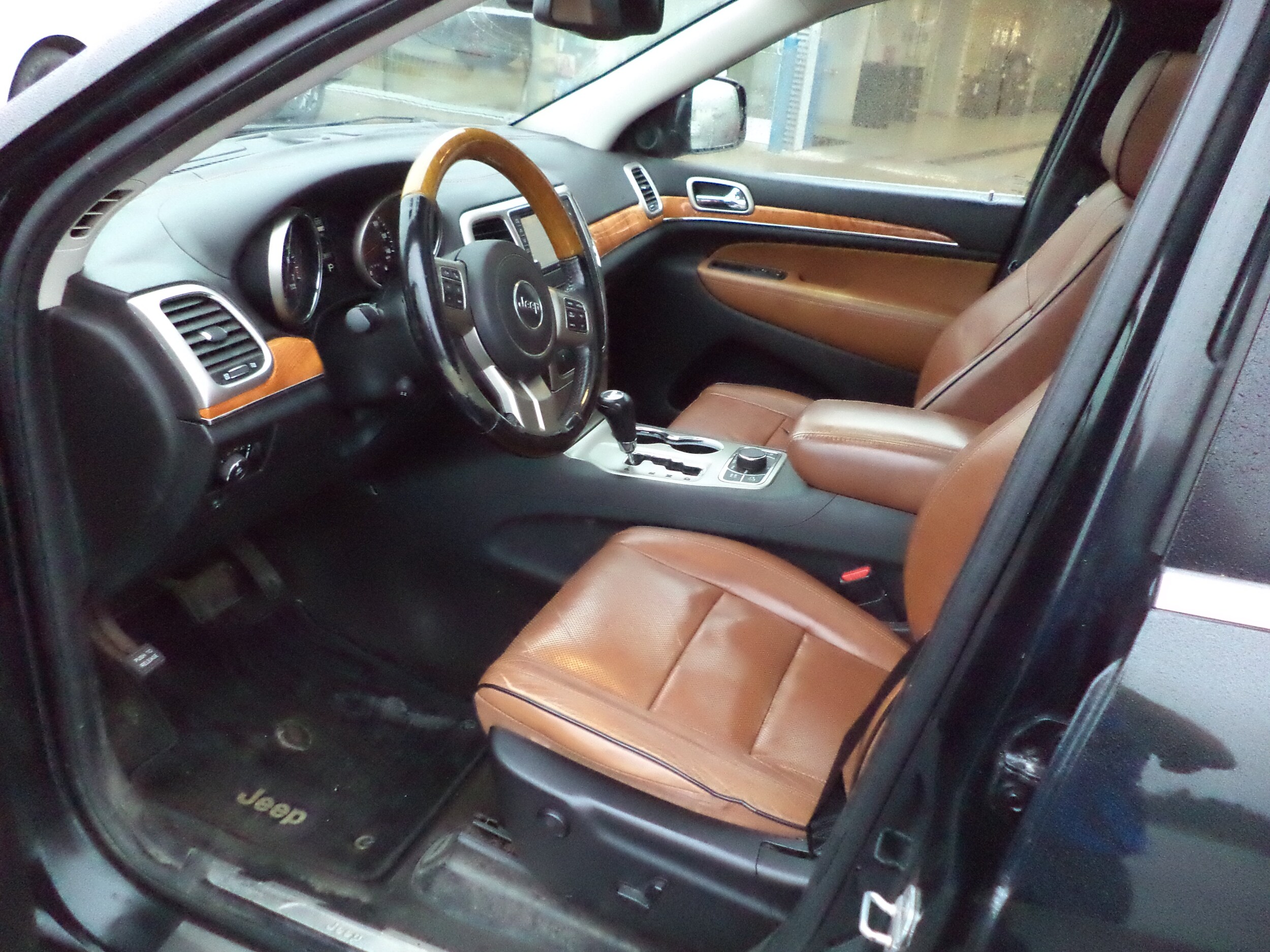 Used 2012 Jeep Grand Cherokee Overland with VIN 1C4RJFCG2CC232103 for sale in Sault Ste. Marie, MI