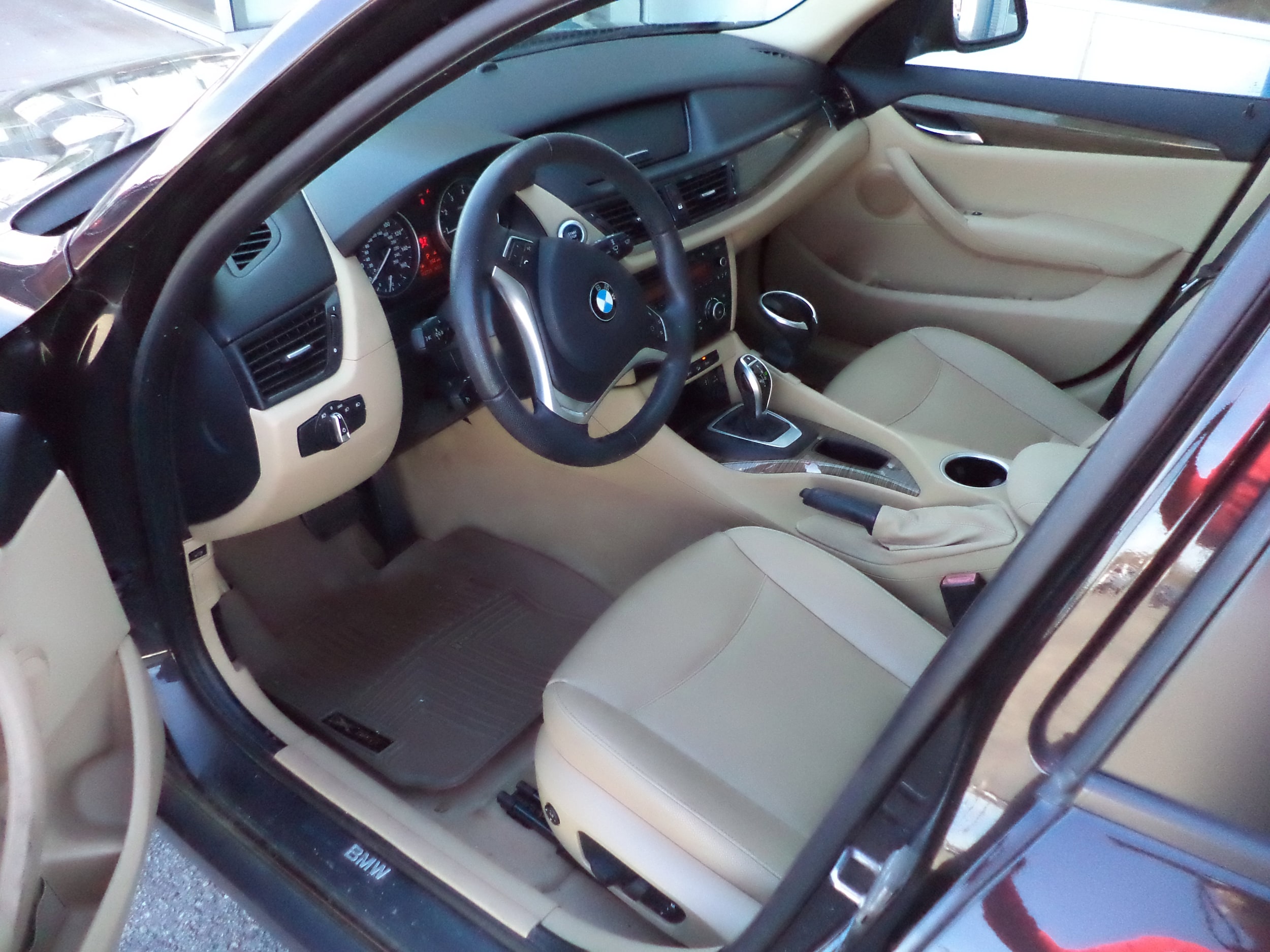 Used 2015 BMW X1 28i with VIN WBAVL1C53FVY30975 for sale in Sault Ste. Marie, MI