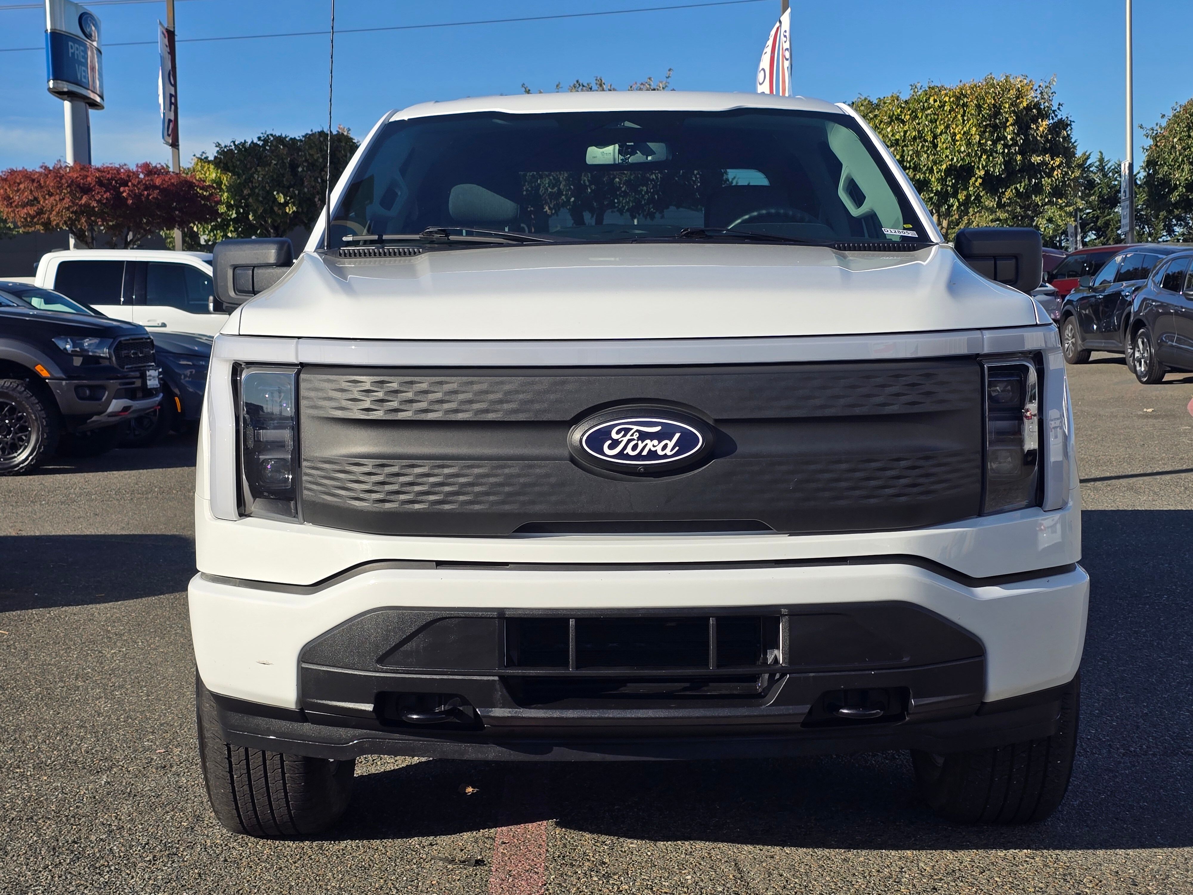 Used 2024 Ford F-150 Lightning XLT with VIN 1FTVW3LK9RWG18575 for sale in Renton, WA