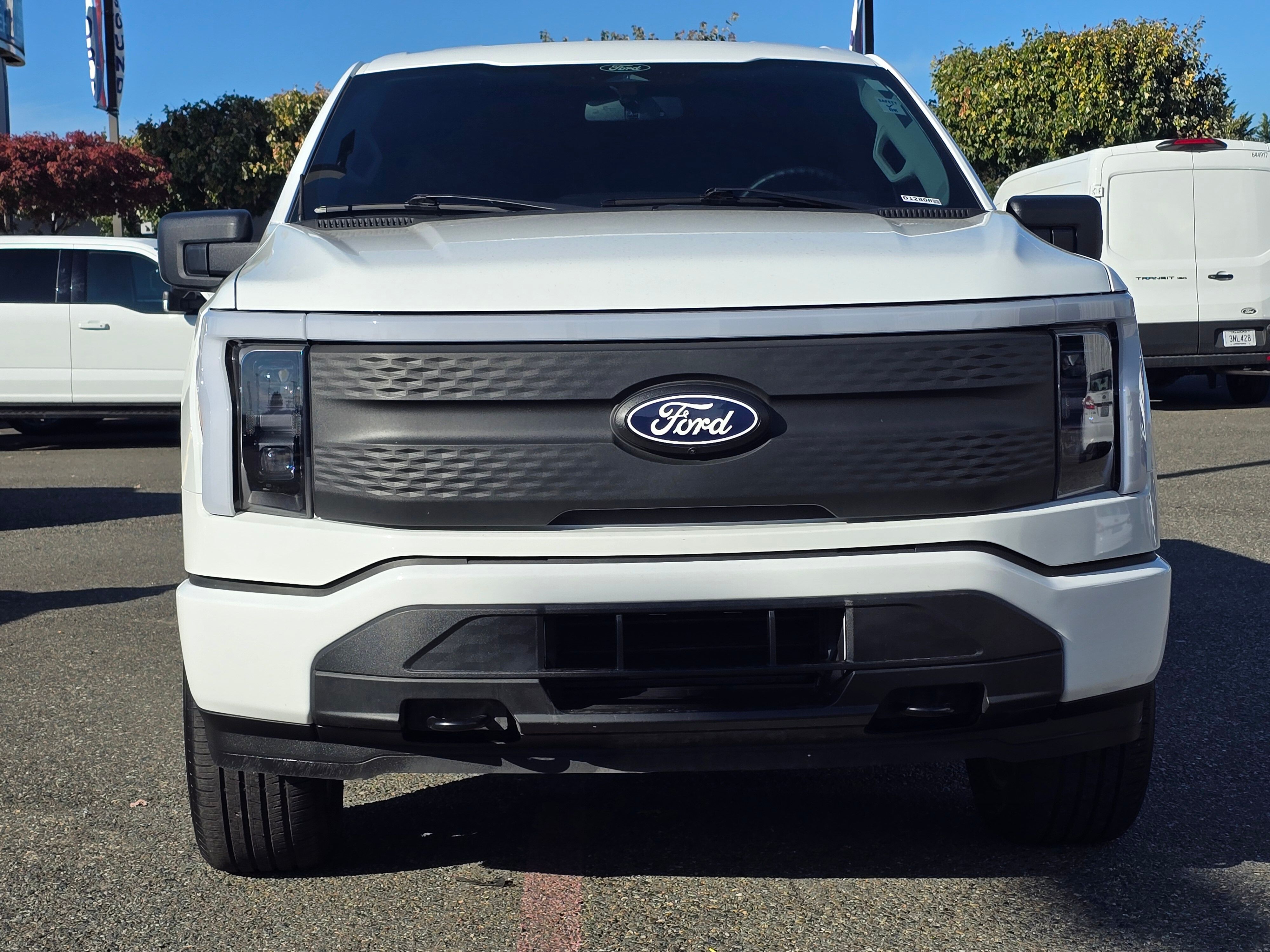 Used 2025 Ford F-150 Lightning XLT with VIN 1FTVW3LK9SWG18937 for sale in Renton, WA