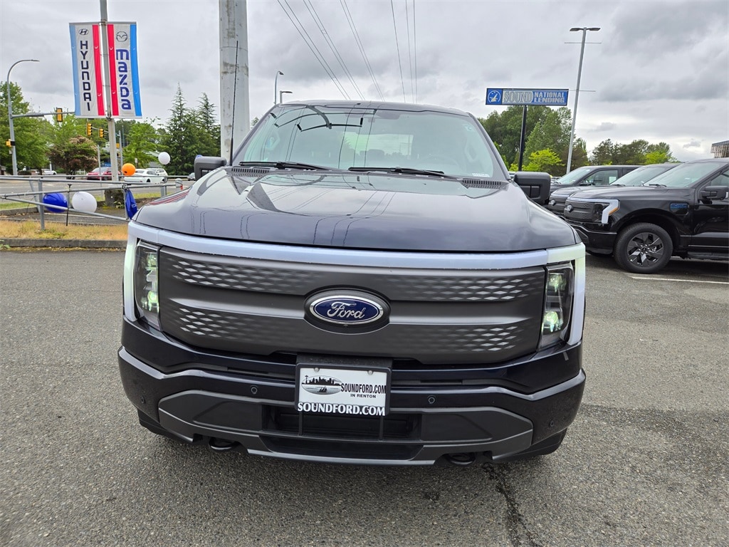Used 2023 Ford F-150 Lightning XLT with VIN 1FTVW1EL9PWG33973 for sale in Renton, WA