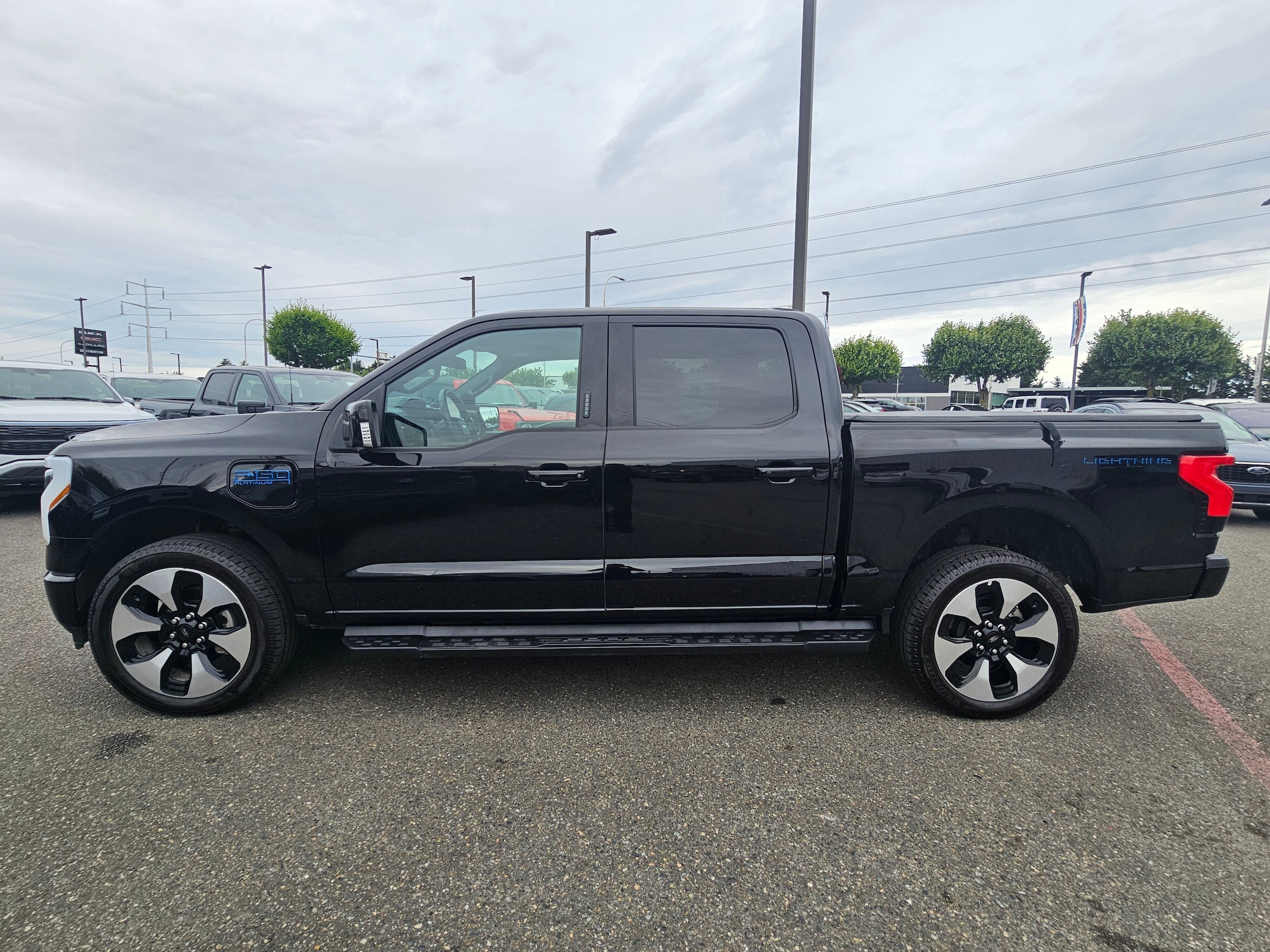 Used 2025 Ford F-150 Lightning Platinum with VIN 1FT6W7L73SWG13904 for sale in Renton, WA