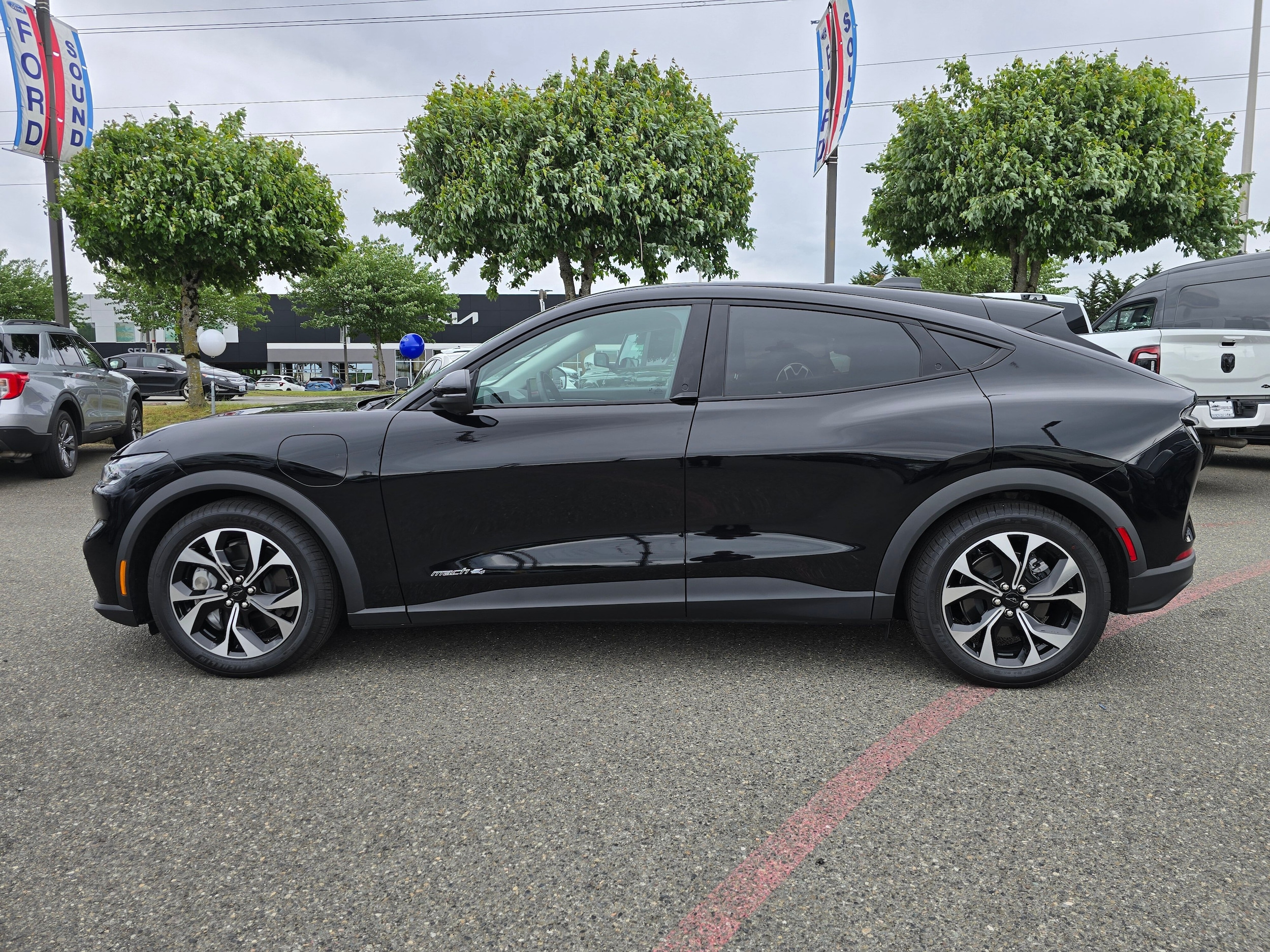 Used 2025 Ford Mustang Mach-E Select AWD with VIN 3FMTK1S57SMA12552 for sale in Renton, WA