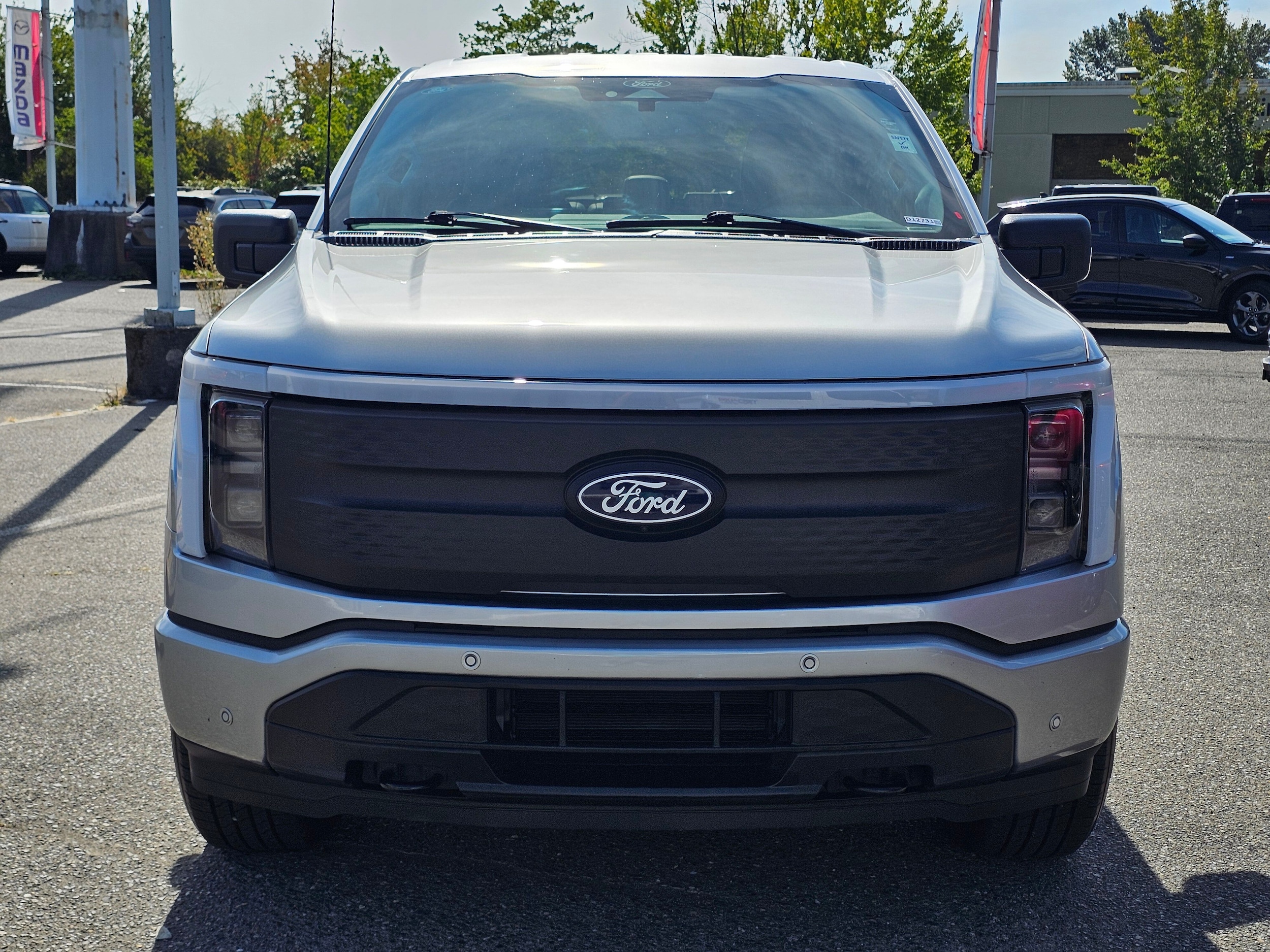 Used 2025 Ford F-150 Lightning Flash with VIN 1FT6W3LU9SWG06079 for sale in Renton, WA
