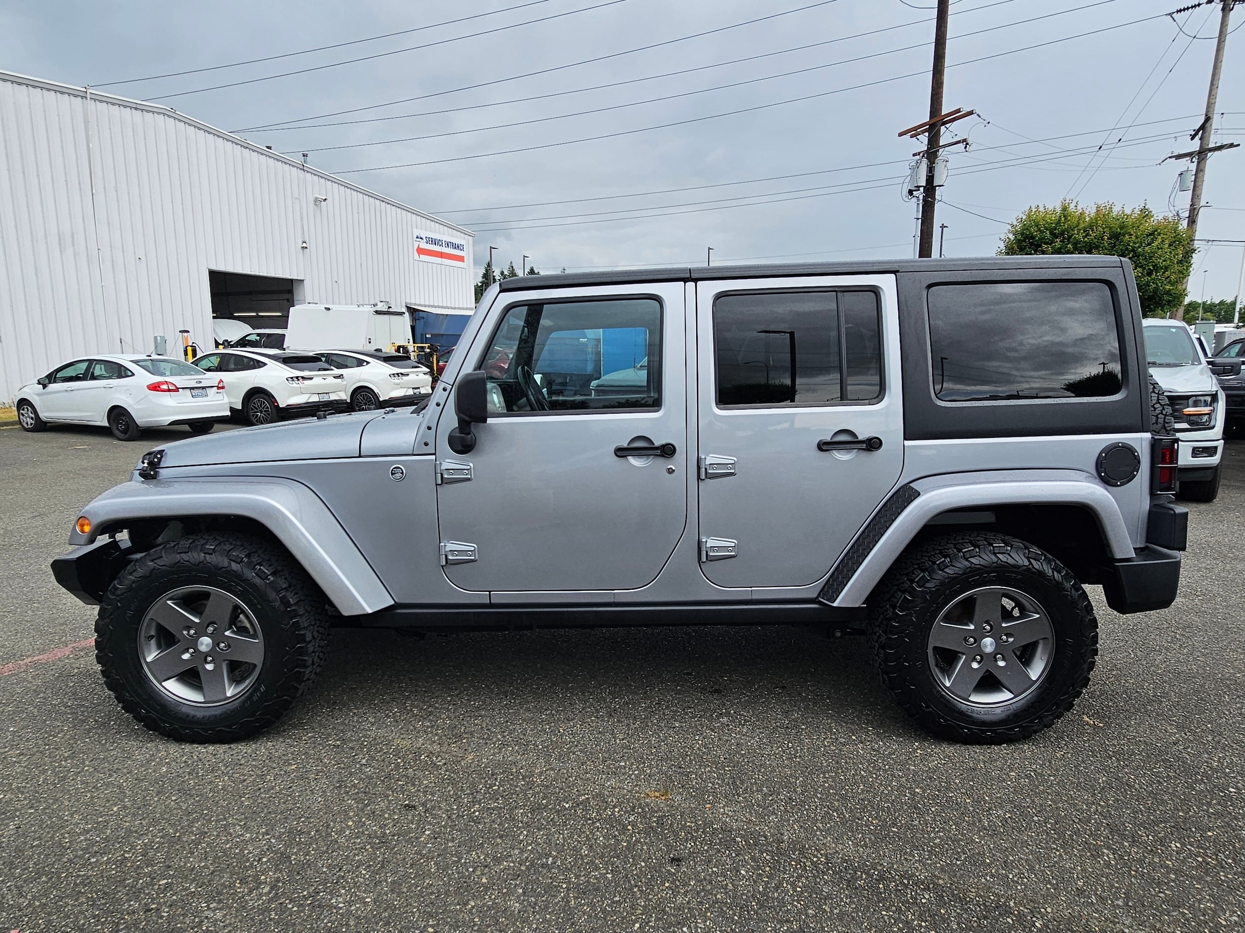 Used 2013 Jeep Wrangler Unlimited Sport with VIN 1C4BJWDG8DL601130 for sale in Renton, WA