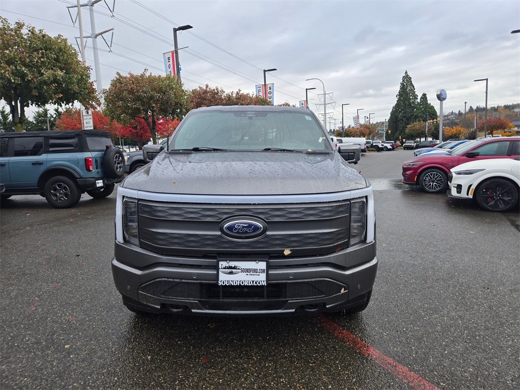 Used 2022 Ford F-150 Lightning Lariat with VIN 1FTVW1EL9NWG00890 for sale in Renton, WA