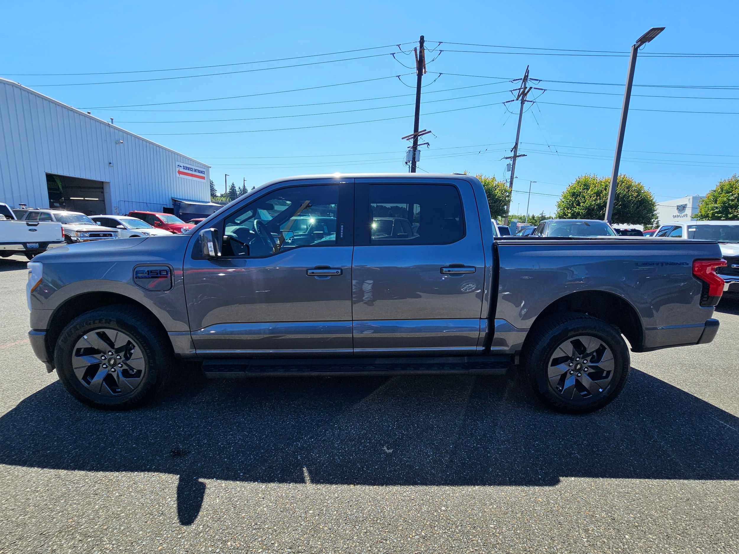 Used 2025 Ford F-150 Lightning Lariat with VIN 1FT6W5L75SWG22060 for sale in Renton, WA