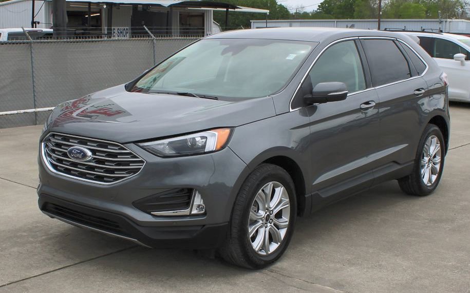 Used 2023 Ford Edge Titanium with VIN 2FMPK4K93PBA23059 for sale in Sour Lake, TX