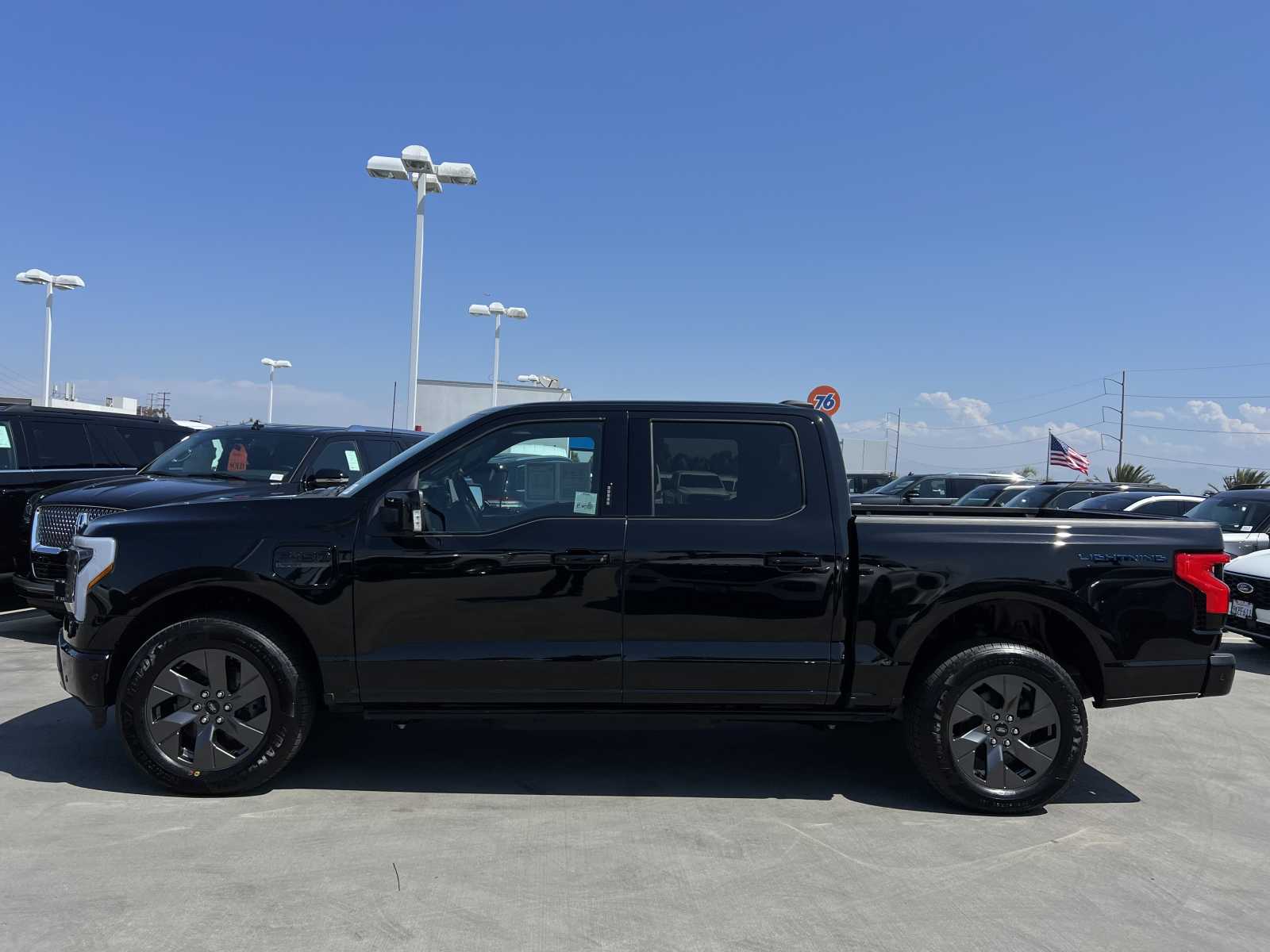 Used 2023 Ford F-150 Lightning Lariat with VIN 1FT6W1EV7PWG30303 for sale in Hawthorne, CA