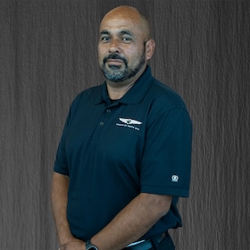 Staff member Juan Flores from ID_541ae68d2137