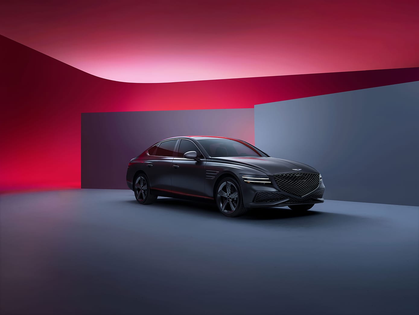2025 G80 Parked on a grey and red background