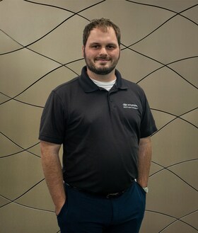 Staff member Mac Lewis from ID_9e2722d49dee