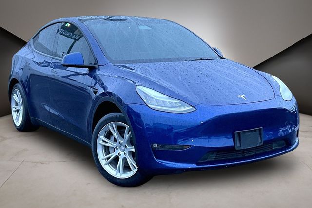 Used 2021 Tesla Model Y Standard Range with VIN 5YJYGAED2MF130210 for sale in Dallas, TX