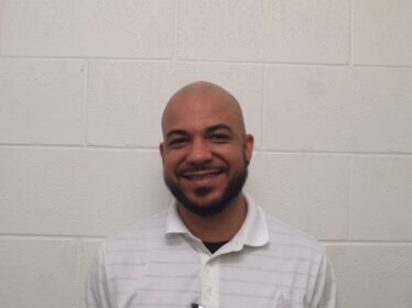 Staff member Moshe Thomas from ID_ab1cc2