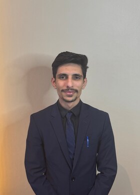 Staff member Adam Tamem Al-Sharae from ID_3d923733ecc9