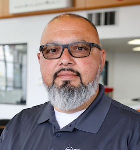 Staff member Emilio Diaz from ID_23428e5b977a