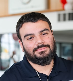 Staff member Cristian Quintanilla from ID_d71b14fb3873