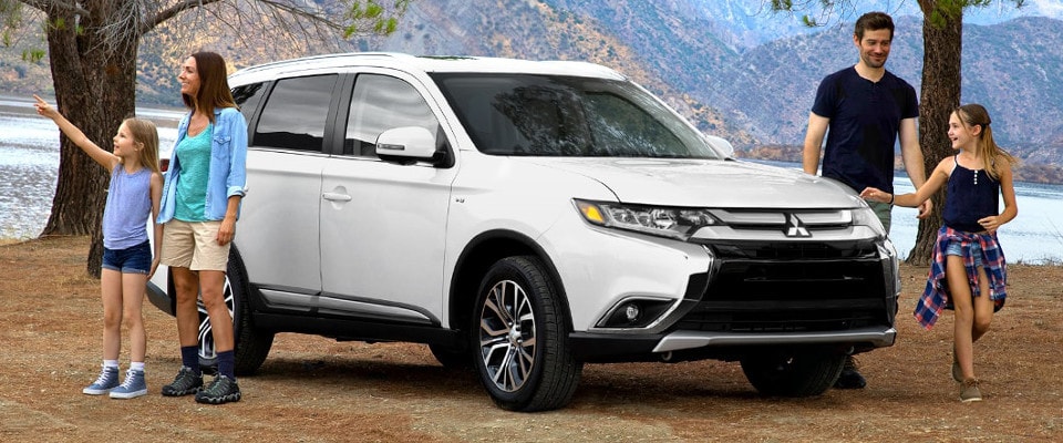 2018 Mitsubishi Outlander parked near a lake