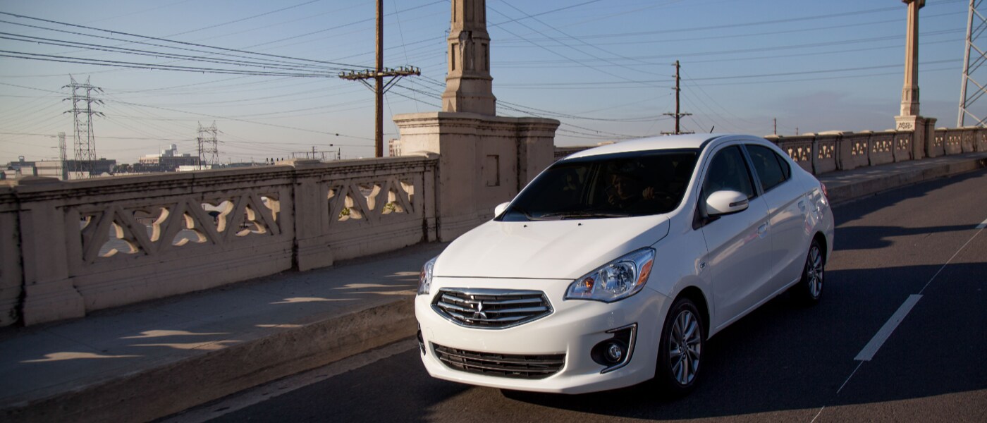 2020 Mitsubishi mirage driving on a bridge