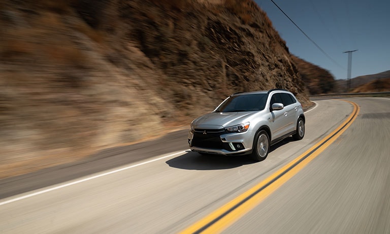 2019 Mitsubishi Outlander Sport driving down street