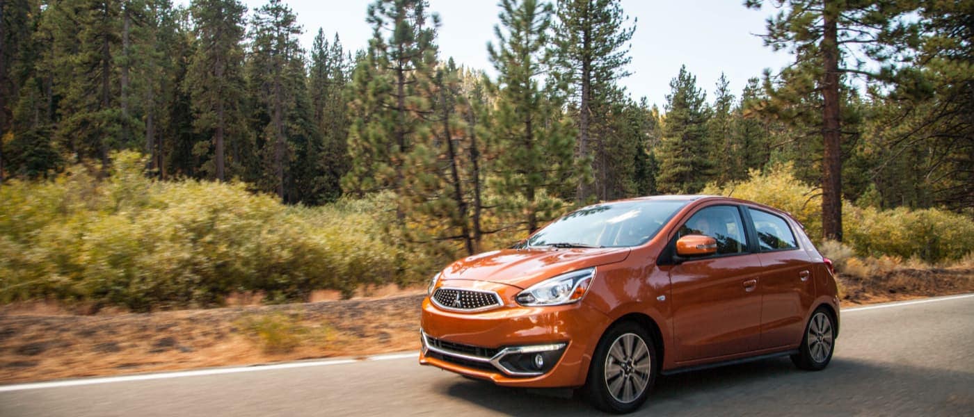 020 Mitsubishi Mirage driving in a forrest