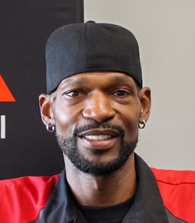Staff member Cleveland Bell from ID_23508c1d6578