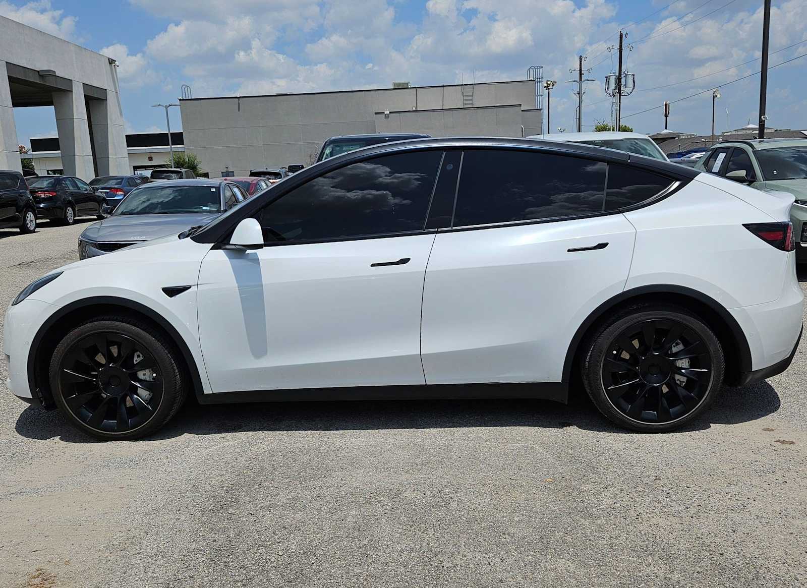 Used 2021 Tesla Model Y Standard Range with VIN 5YJYGDED0MF174496 for sale in Dallas, TX