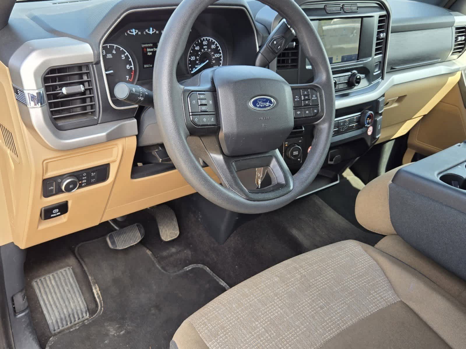 Used 2023 Ford F-150 XLT with VIN 1FTFW1E86PFA21505 for sale in Rockwall, TX